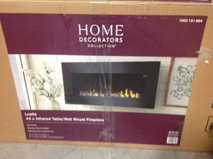 lot 54 image: Home Decorators Collection 42 in. Infrared Wall Mount Electric Fireplace in Black not used