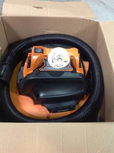 lot 62 image: 18-Volt 9 Gal. Cordless WetDry Shop Vacuum (Tool Only) with Car Nozzle, Utility Nozzle, Wet Nozzle and Extension Wandsin good condition