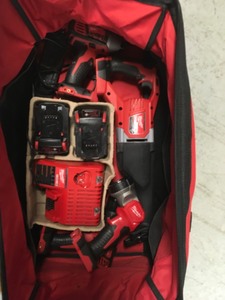 lot 135 image: Milwaukee M18 18-Volt Lithium-Ion Cordless Combo Tool Kit (4-Tool) w(2)  Batteries, (1) Charger, (1) Tool Bag in good condition