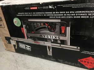 lot 139 image: Skil 15 Amp Corded Electric 10 in. Heavy duty worm drive  Table Saw with Folding Stand not used
