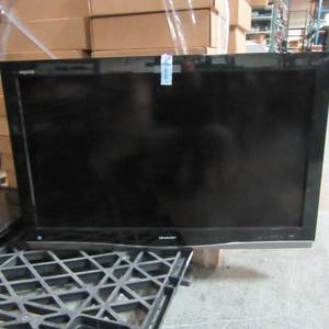 lot 14 image: Sharp 37 in LCD TV, Tested WorkingNo remote , no stand was used as a wall mount