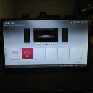 lot 15 image: LG 42 in LCDLED Flatscreen TV, with partial wall mount - no remote