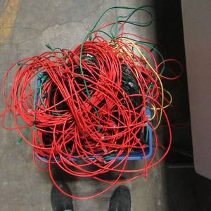 lot 38 image: Large Overflowing box of Cables misc lengths and colors