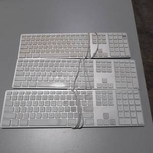 lot 57 image: Lot of 3 Apple Keyboards wfull number pads