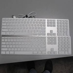 lot 88 image: Lot of 2 ultra thin Apple Keyboards wnumber pad Great for Travel