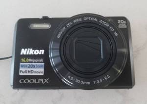 lot 73 image: Nikon COOLPIX S7000 & more