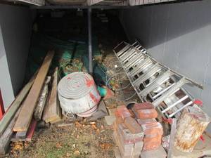 Lot of Lumber, bricks, gutter parts...