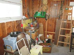 Corner full of assorted garage item...