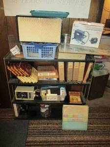 Shelf full of items, vintage clock,...