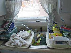 Lot of kitchen cleaning supplies...