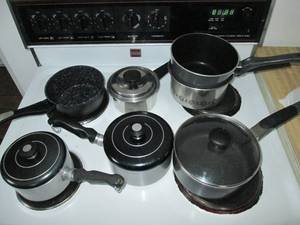 Lot of sauce pans with lids...