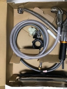 lot 18 image: Moen Adler Single-Handle Low Arc Standard Kitchen Faucet with Side Sprayer in Chrome