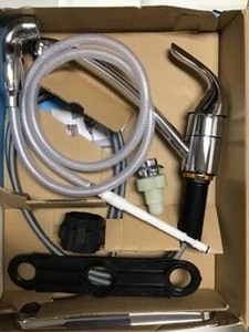 lot 20 image: Moen Adler Single-Handle Low Arc Standard Kitchen Faucet with Side Sprayer in Chrome