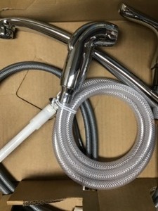 lot 24 image: Moen Adler Single-Handle Low Arc Standard Kitchen Faucet with Side Sprayer in Chrome