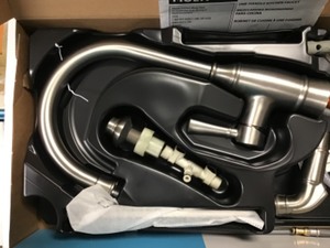 lot 86 image: Moen Noell Single-Handle Standard Kitchen Faucet with Side Sprayer in Spot Resist Stainless