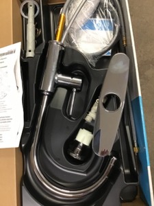 lot 92 image: Moen Sombra Single-Handle Standard Kitchen Faucet with Side Sprayer in Chrome
