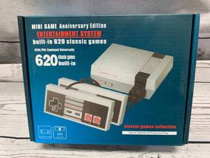 lot 27 image: Mini Entertainment Game System with 620 Games (new in box)