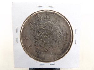 lot 98 image: Antique Japanese Silver One Yen Dragon Coin