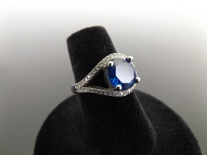 lot 65 image: .925 Sterling Silver Sapphire Crystal Ring Size 6