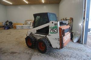 lot 1 image: Early 2000 Bobcat 753G Skid Loader Skid Steer