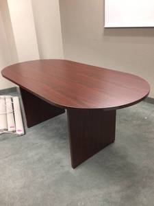 lot 17 image: MSRP $250&nbspLorell Essentials 72 Oval Office Mahogany Finish Conference Table - Like New Condition