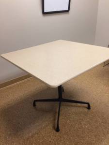 lot 87 image: MSRP $1200 HERMAN MILLER HIGH QUALITY Eames Square Table With Universal Leveling Base&nbspDesigned by Charles and Ray Eames - Chairs Not Included