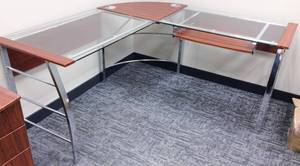 lot 20 image: Gorgeous Contemporary Cherry Finish Glass Chrome Corner Workstation With Thick Heavy Duty Tempered Glass Which Makes This&nbsp62W L-Shaped Desk&nbspPlanted Wherever You Place It Slide Out Keyboard Tray Included - Like New Condition