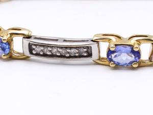 lot 9 image: Dazzling 2.8 Carat Tanzanite and 1.44 Carat Diamond Estate Tennis Bracelet in Two-Tone 14k Gold - $4600 Appraisal