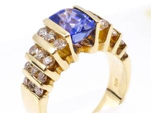 lot 10 image: 1.5 Carat Tanzanite and 1 Carat Diamond Estate Ring in 14k Yellow Gold - $4735.63 Appraisal