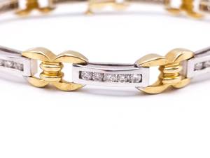 lot 13 image: Beautiful 1.5 Carat Diamond Estate Tennis Bracelet in Two-Tone 14k Gold