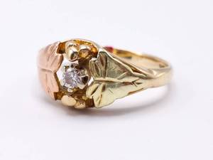lot 37 image: Two-Toned Black Hills Gold Diamond Estate Ring in 10k Gold