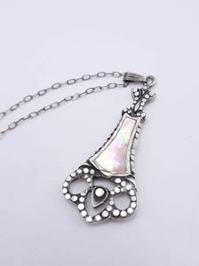 lot 54 image: Elegant and Vintage Mother-of-Pearl Estate Pendant in Sterling Silver
