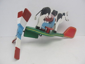 lot 199 image: Vintage Pained Wooden Folk Art Whirligig - Airplane wFarmer Milking Cow