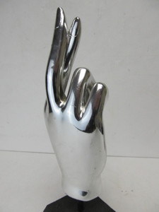 lot 142 image: 13 Metallic Crossing My Fingers Hand Sculpture