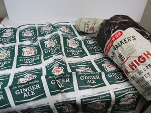 lot 155 image: Vintage Inflatable Advertising Liquor Store Whiskey Display bottle & Canada Dry Raft