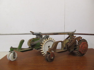 lot 237 image: 2 Vintage Cast Iron Walking Tractor Sprinklers