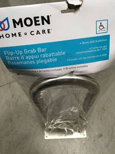 lot 38 image: MOEN 30 in. x 1-14 in. Flip-up Screw Grab Bar in Peened Stainless Steel in good condition