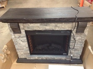 lot 400 image: Home Decorators Collection  Highland 50 in. Faux Stone Mantel Electric Fireplace in Gray  in good conditions