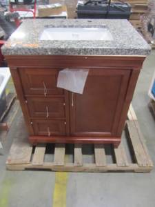 lot 50 image: Home Decorators Collection Naples 31 in. W x 22 in. D Vanity in Warm Cinnamon with Granite Vanity Top in Giallo Ornamental with White Sink NACA3021DL-GIA