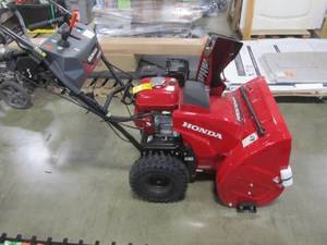 lot 108 image: Honda 24 in. Hydrostatic Wheel Drive 2-Stage Snow Blower with Electric Joystick Chute Control HSS724AW
