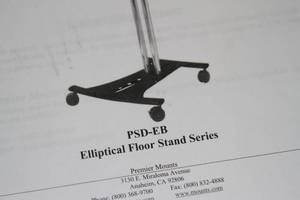 lot 90 image: Premier Mounts Elliptical Floor Cart Mobile Rolling Monitor Stand for Flat Screen Televisions  Monitors  Displays