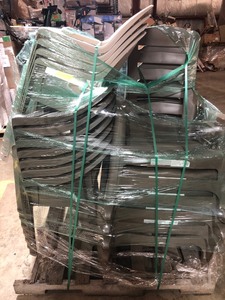 lot 23 image: Pallet with assorted outdoor chairs not used. Includes Rocking Chair,  Patio Club Chair and stack Chairs most in like new condition