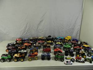lot 32 image: Huge Assortment of Monster Trucks and More
