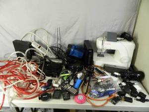 lot 98 image: Sewing Machine, Rope Light, Assorted Electronics