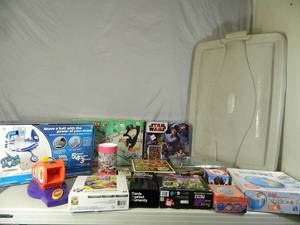 lot 123 image: Large Tote with Lid FULL of Puzzles and Games