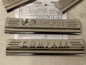 lot 40 image: New Jeep Compass Stainless Steel Accessory Kit