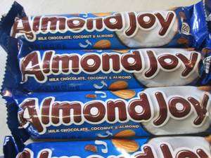 lot 63 image: 12 Almond Joy Candy Bars Best by Oc...