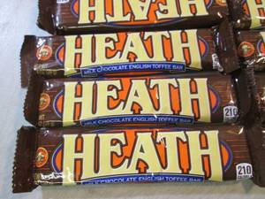 lot 69 image: 12 Heath Candy Bars Best by Jan 202...