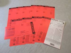 lot 129 image: Lot of 12 Fake Prank Parking Ticket...