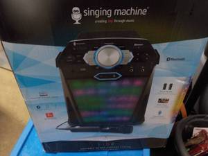 lot 40 image: Blue Tooth Singing Machine- new...